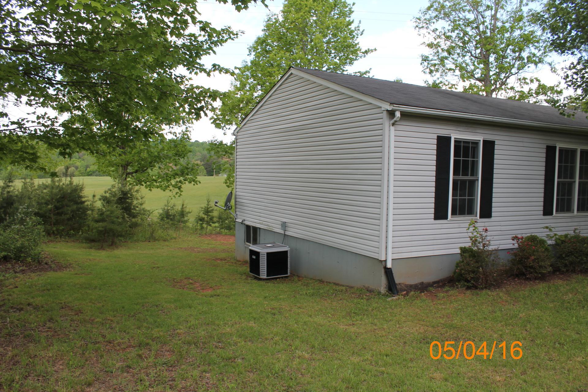 635 Briar Ridge Road Henry, VA 24102 - Photo 16 of 25 a view of a back yard of the house