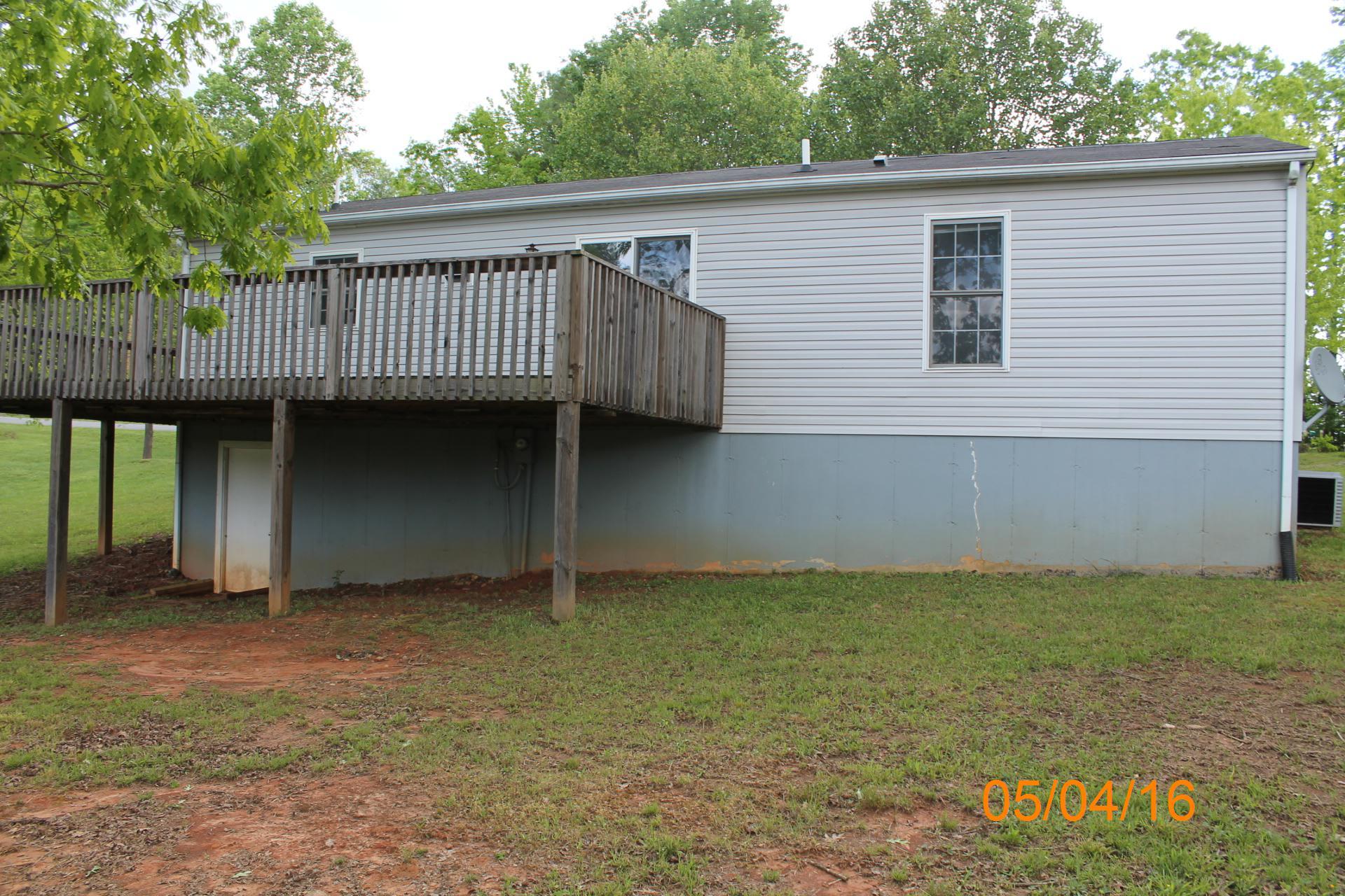 635 Briar Ridge Road Henry, VA 24102 - Photo 17 of 25 a front view of a house with garage