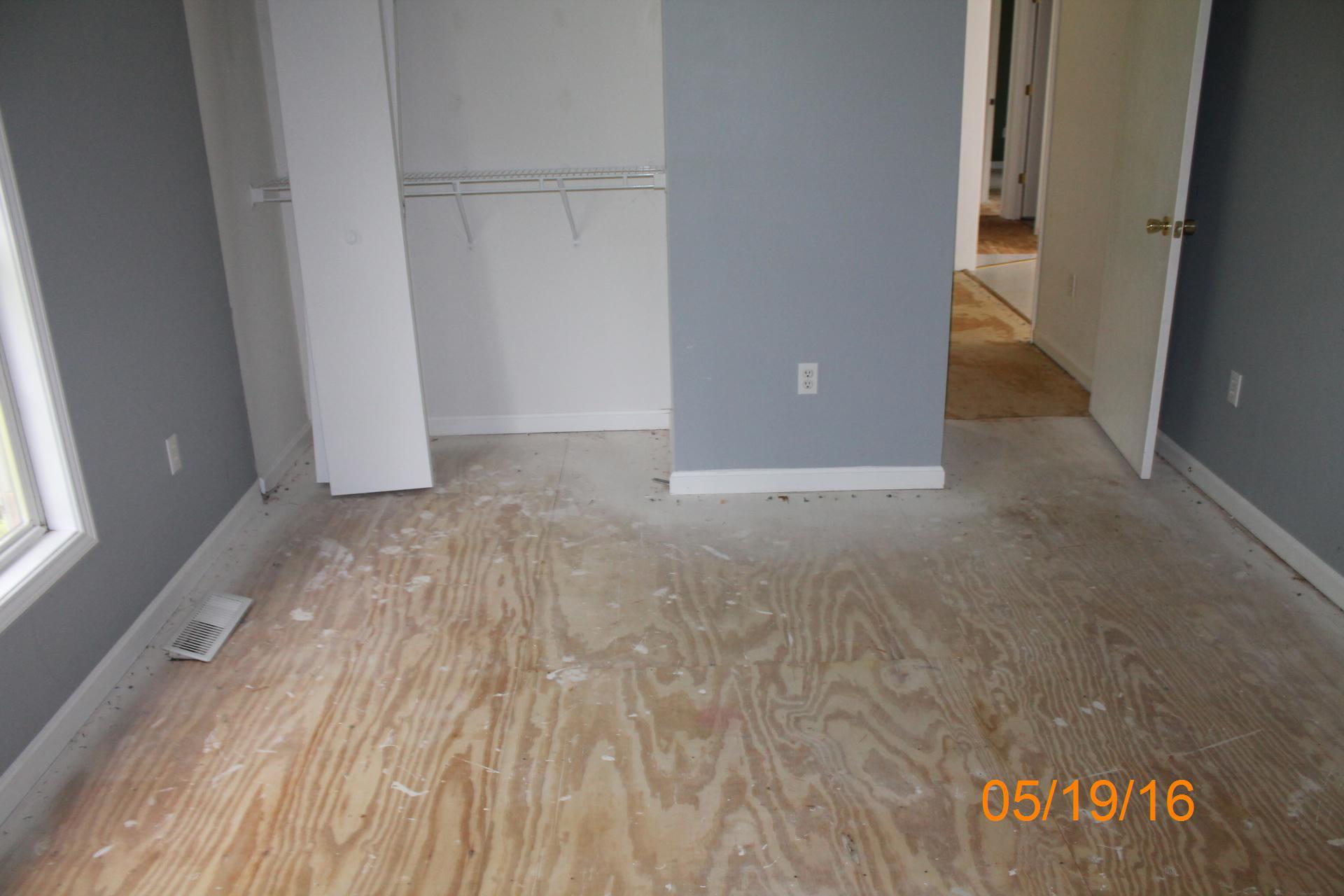 635 Briar Ridge Road Henry, VA 24102 - Photo 25 of 25 a view of an empty room with wooden floor and a window