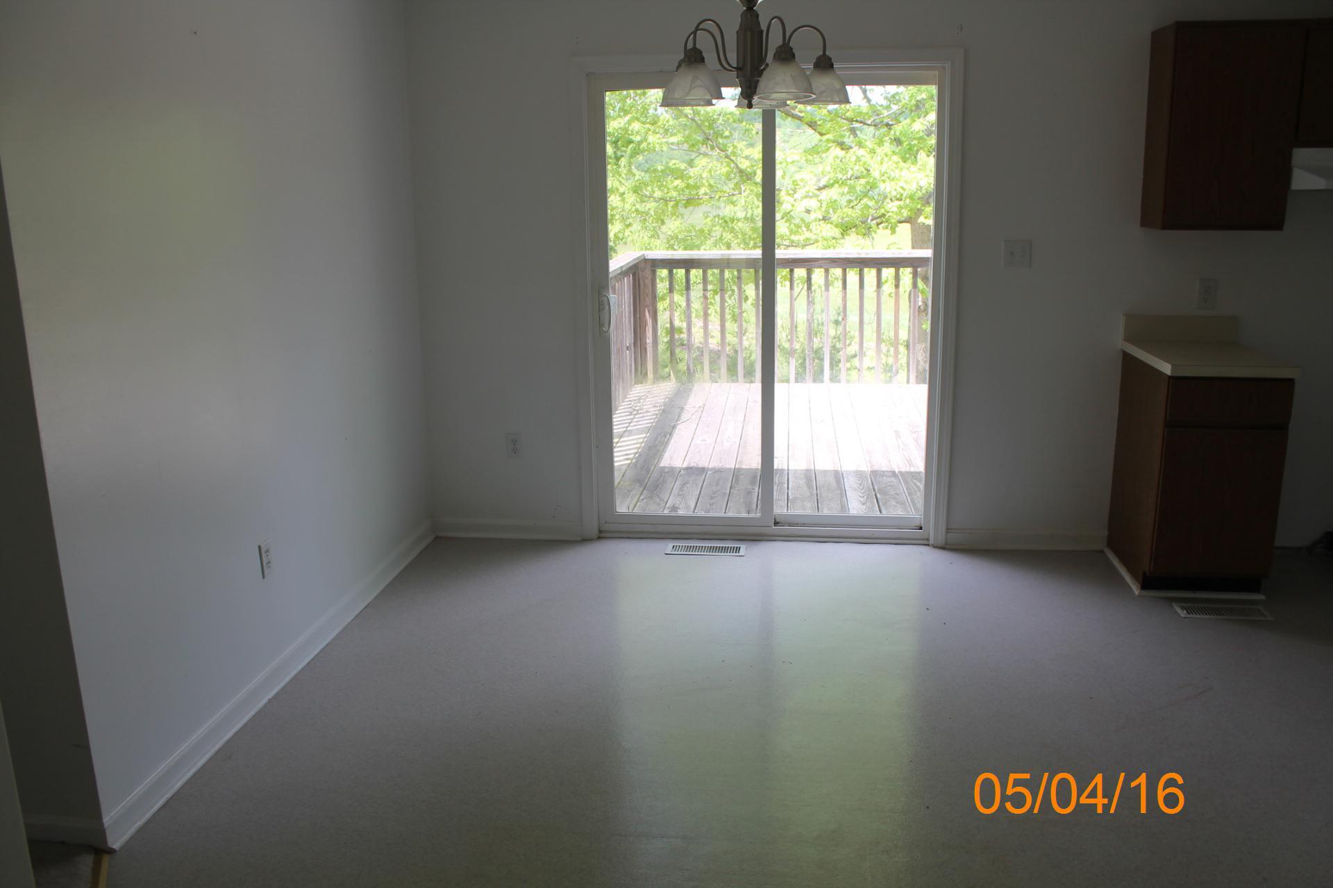 635 Briar Ridge Road Henry, VA 24102 - Photo 7 of 25 a view of an empty room with a window