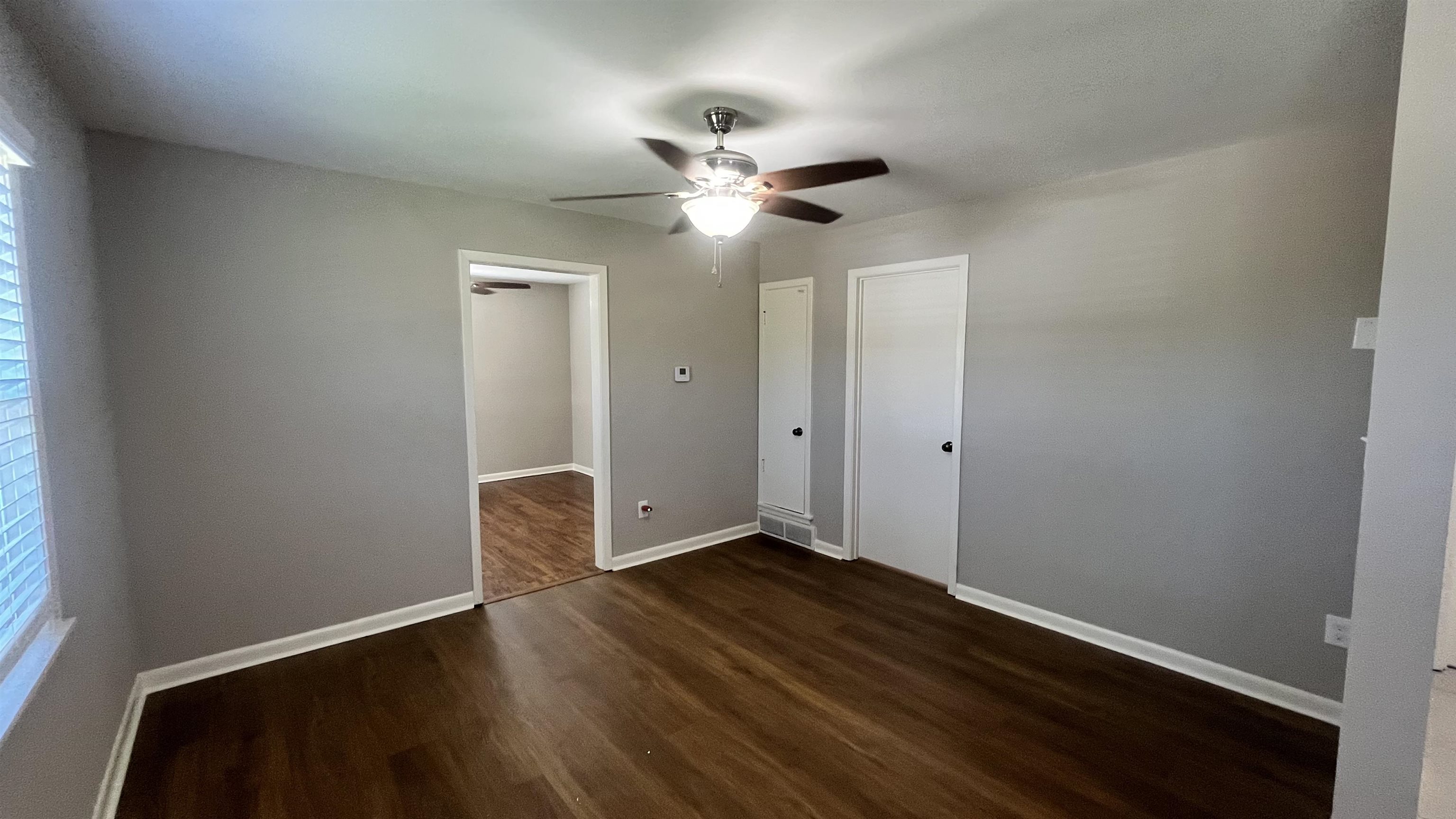 121 West Street Collierville, TN 38017 - Photo 3 of 16 a view of an empty room with wooden floor