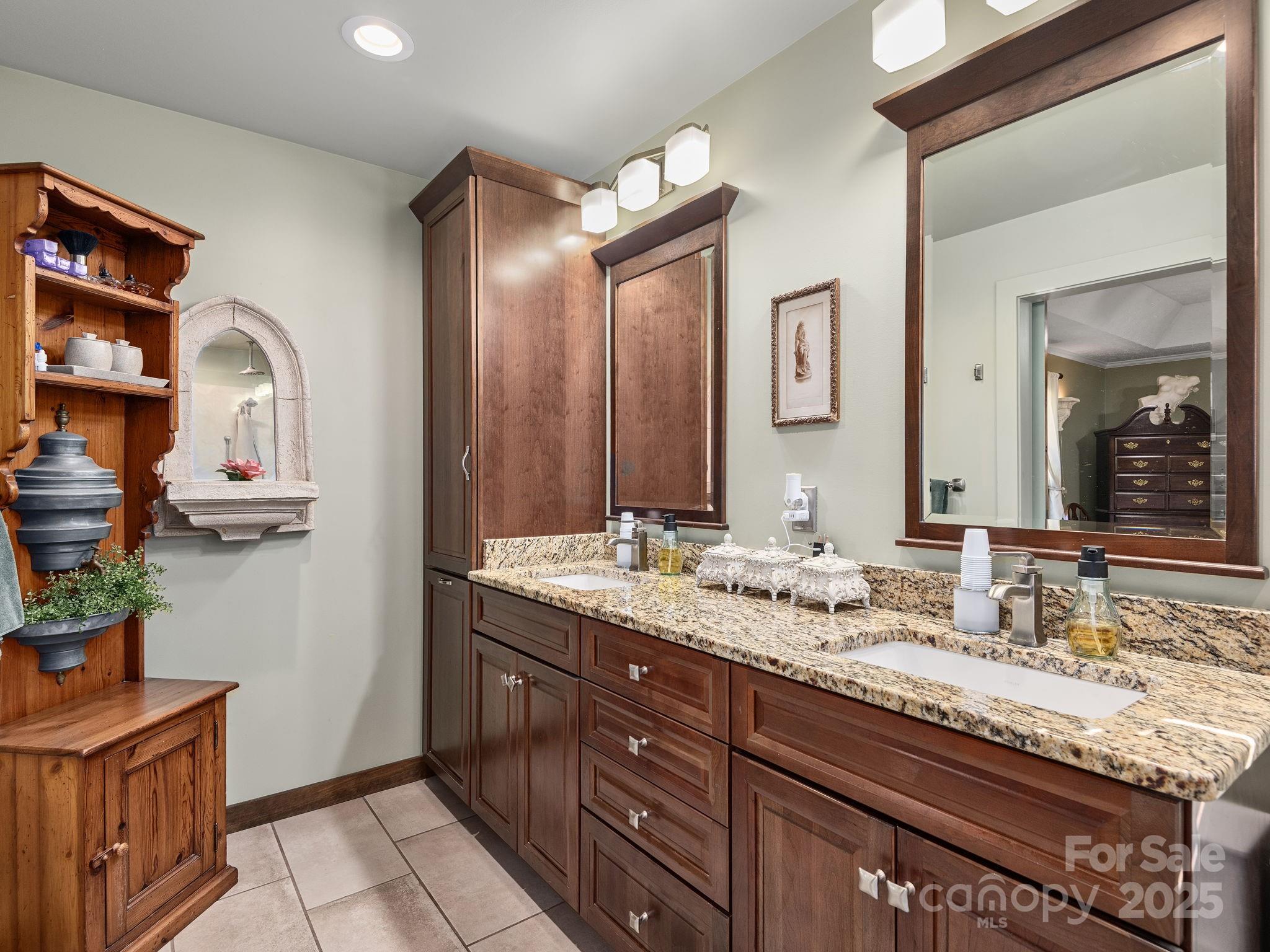 201 Sean Way Hendersonville, NC 28792 - Photo 15 of 24 a bathroom with a granite countertop double vanity sink and a mirror