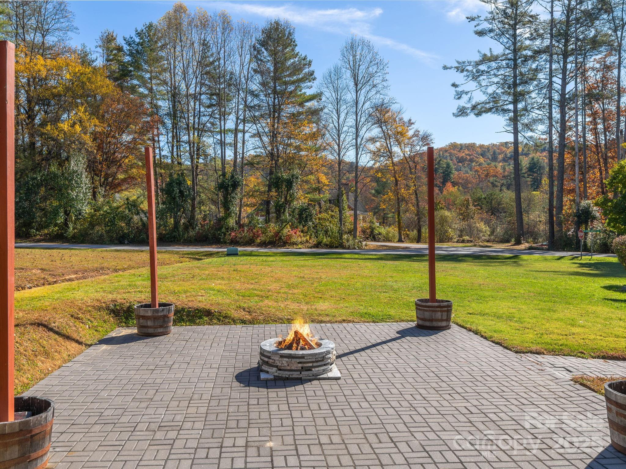 201 Sean Way Hendersonville, NC 28792 - Photo 19 of 24 a house view with a swimming pool and outdoor space