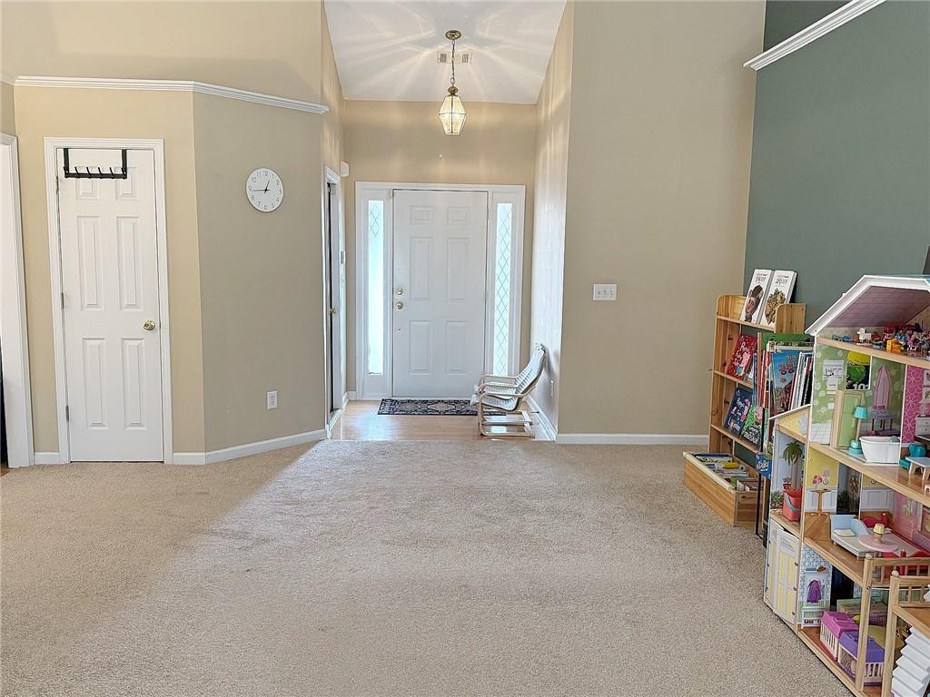 69 Morning Top Court Suwanee, GA 30024 - Photo 16 of 34 an empty room with bookshelf and closet