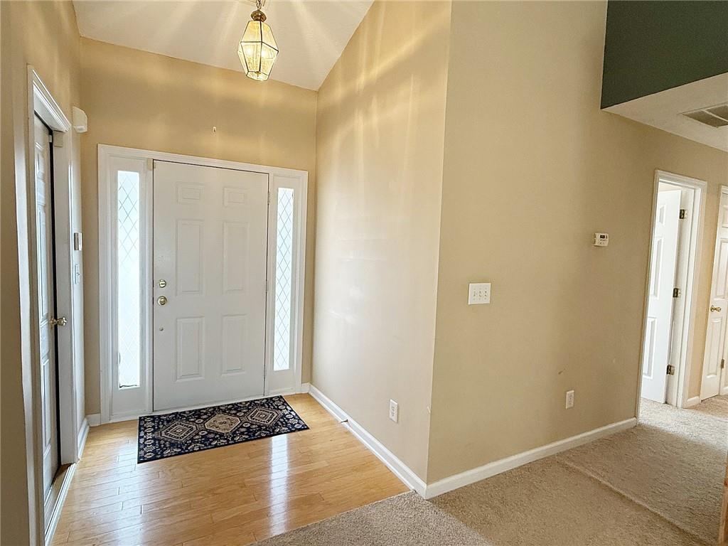 69 Morning Top Court Suwanee, GA 30024 - Photo 4 of 34 a view of walk in closet
