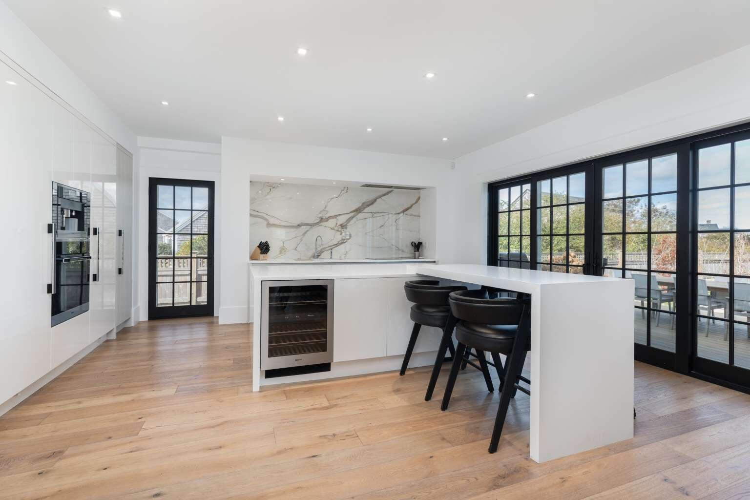 11 A Meadow Lane, Unit B Nantucket, MA 02554 - Photo 4 of 20 a view of a big room with furniture and windows