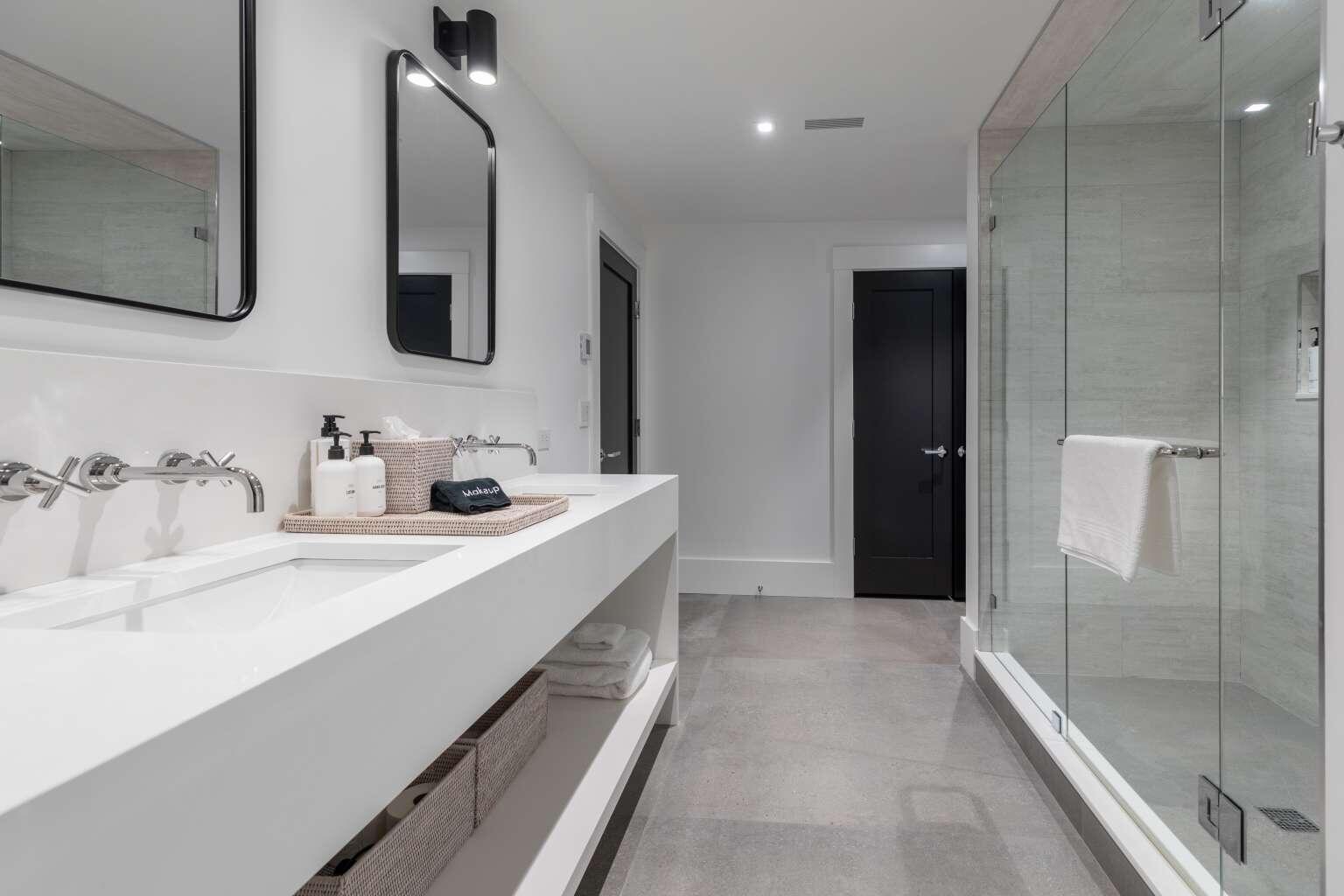 11 A Meadow Lane, Unit B Nantucket, MA 02554 - Photo 10 of 20 a bathroom with a double vanity sink mirror and shower