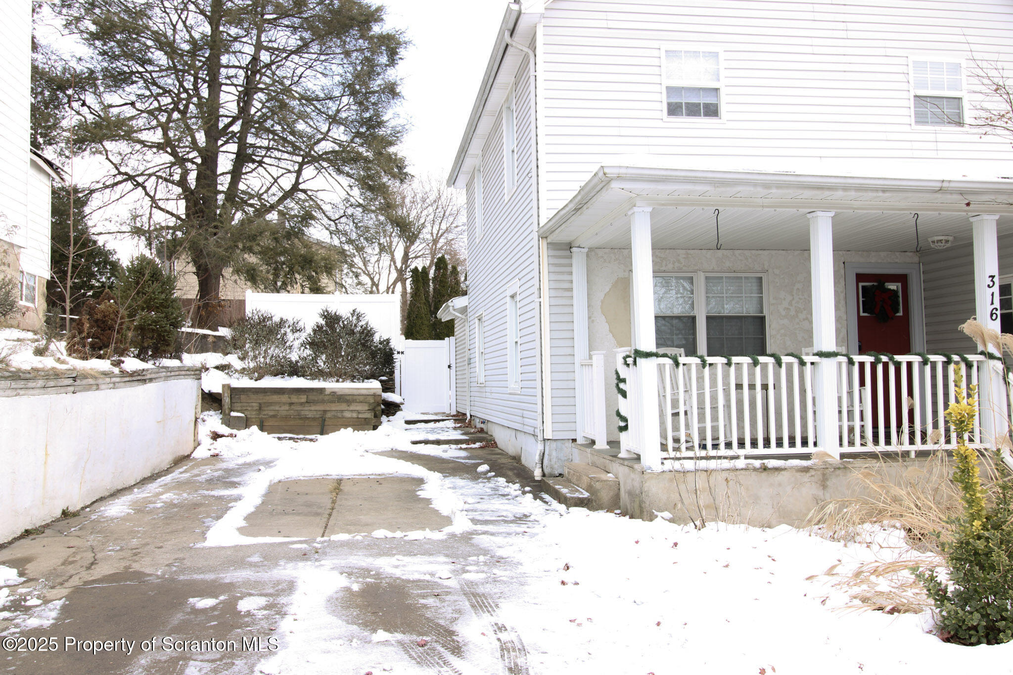 316 Bridge Street Blakely, PA 18452 - Photo 2 of 39 Concrete driveway to park in