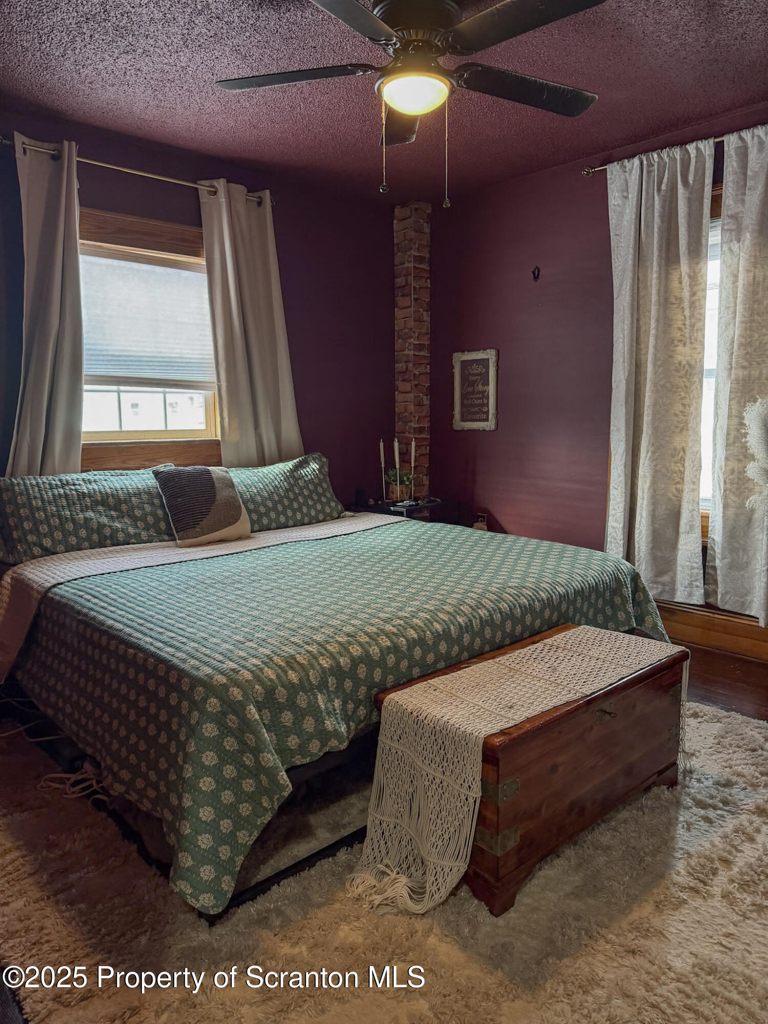 316 Bridge Street Blakely, PA 18452 - Photo 26 of 39 a bedroom with a bed and window