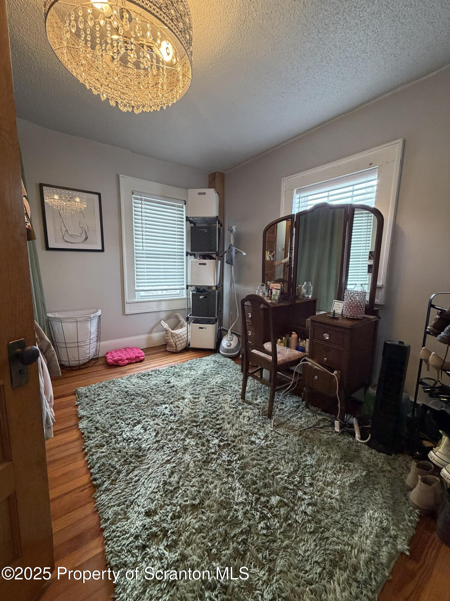 316 Bridge Street Blakely, PA 18452 - Photo 29 of 39 a living room with furniture and a window