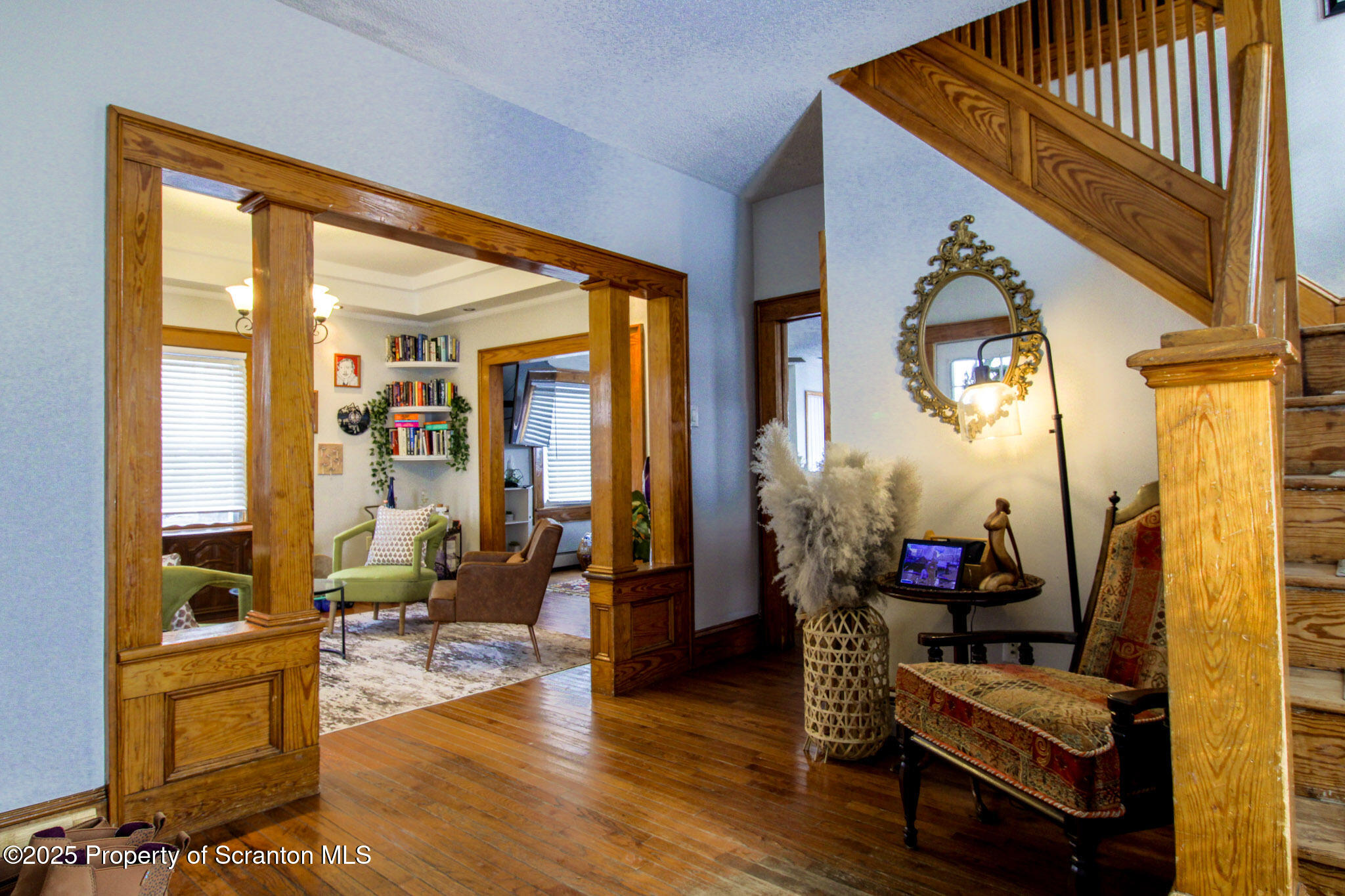316 Bridge Street Blakely, PA 18452 - Photo 7 of 39 a living room with furniture and wooden floor