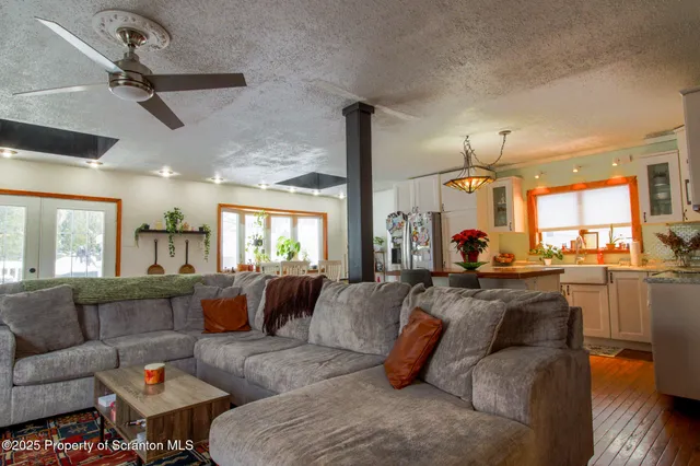 a view of a living room and dining room