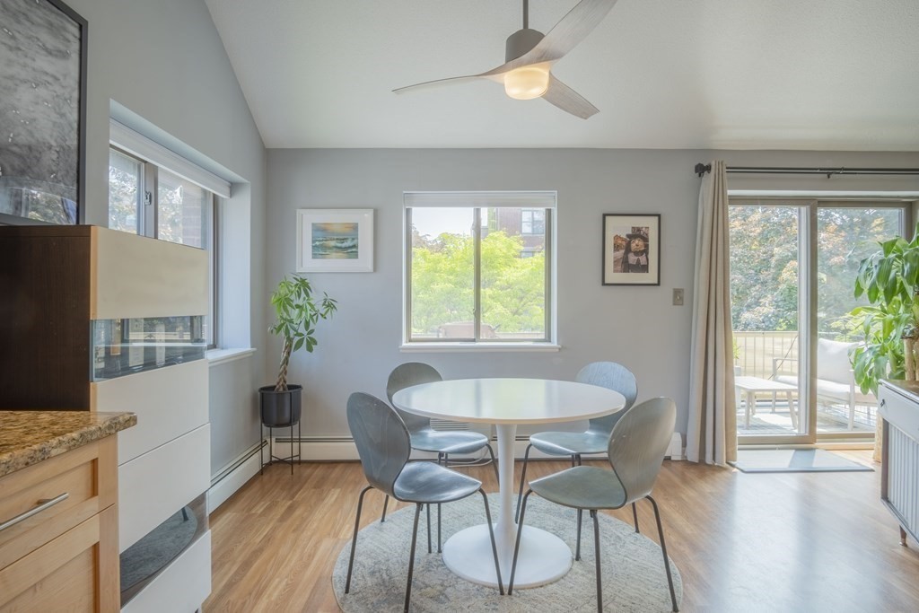 9 Barton Square, Unit 201 Salem, MA 01970 - Photo 19 of 42 a view of a dining room with furniture window and wooden floor