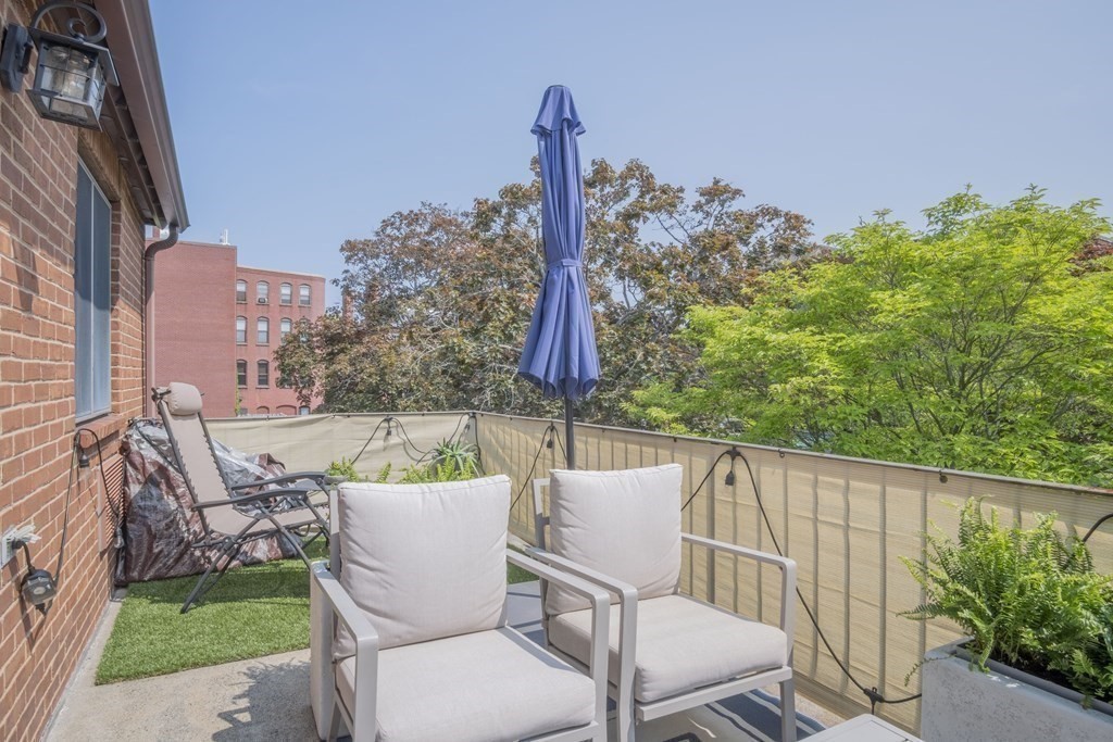 9 Barton Square, Unit 201 Salem, MA 01970 - Photo 35 of 42 a outdoor view with a sitting space