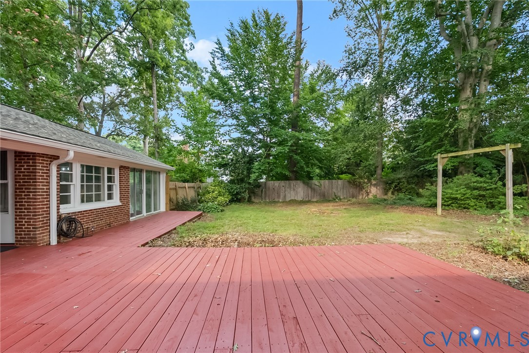 1136 Overbrook Road Petersburg, VA 23805 - Photo 44 of 51 Expansive red-stained wooden deck offering direct