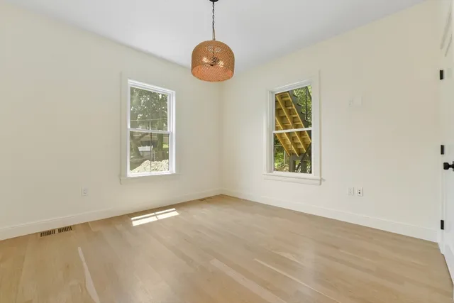 an empty room with windows