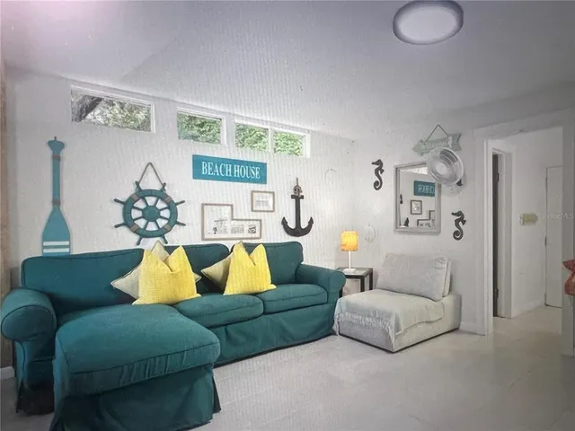 a living room with furniture and a couch