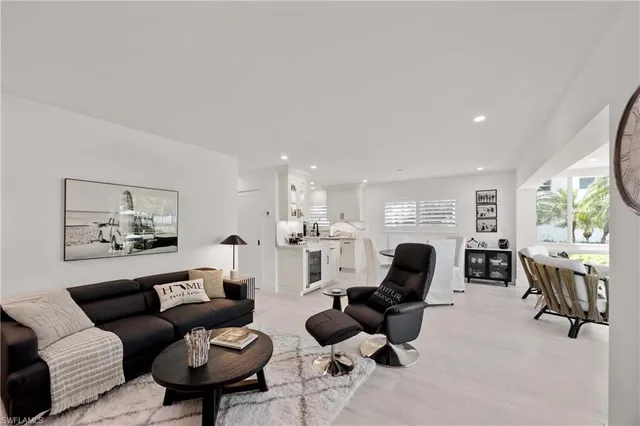 a living room with furniture or couch and a flat screen tv