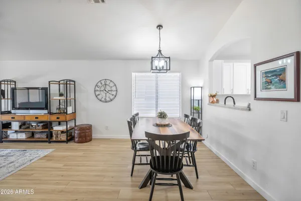 a view of a dining room with furniture