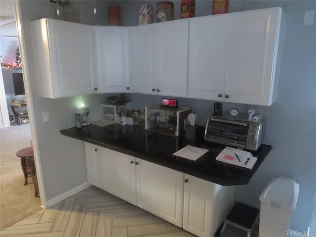 a kitchen with stainless steel appliances a refrigerator and a stove