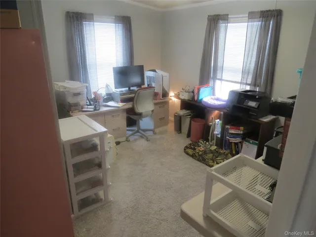 a bedroom with a bed and a mirror