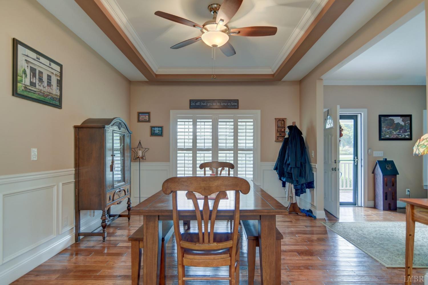 1822 Timber Ridge Road Bedford, VA 24523 - Photo 9 of 33 a view of a dining room with furniture window and wooden floor
