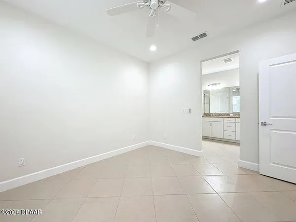 a view of a fountain in front of the house