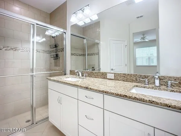 a view of a building with a cars park