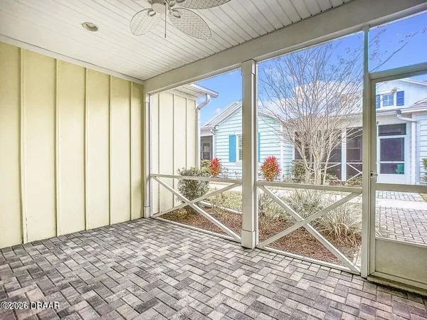 a kitchen with kitchen island granite countertop a sink a counter space appliances and cabinets