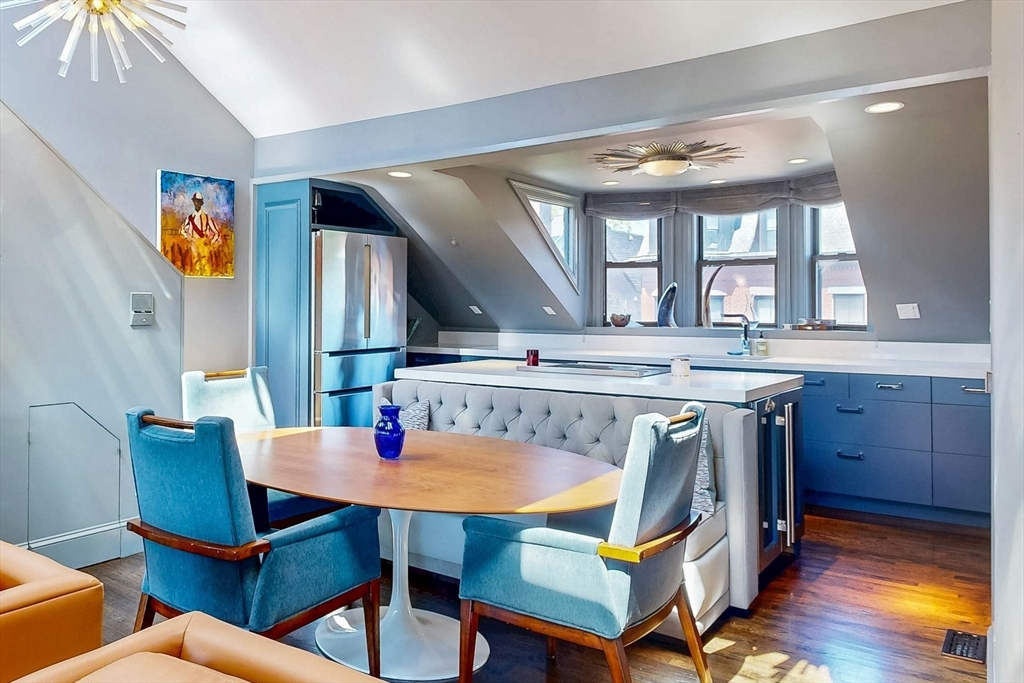 38 Worcester Street, Unit 3 Boston, MA 02118 - Photo 12 of 24 a view of a dining room with furniture and window