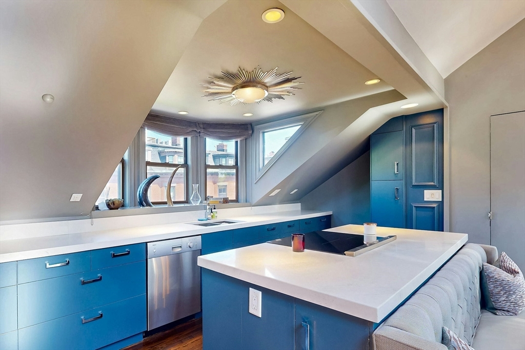 38 Worcester Street, Unit 3 Boston, MA 02118 - Photo 15 of 24 a kitchen with a stove a sink and a refrigerator