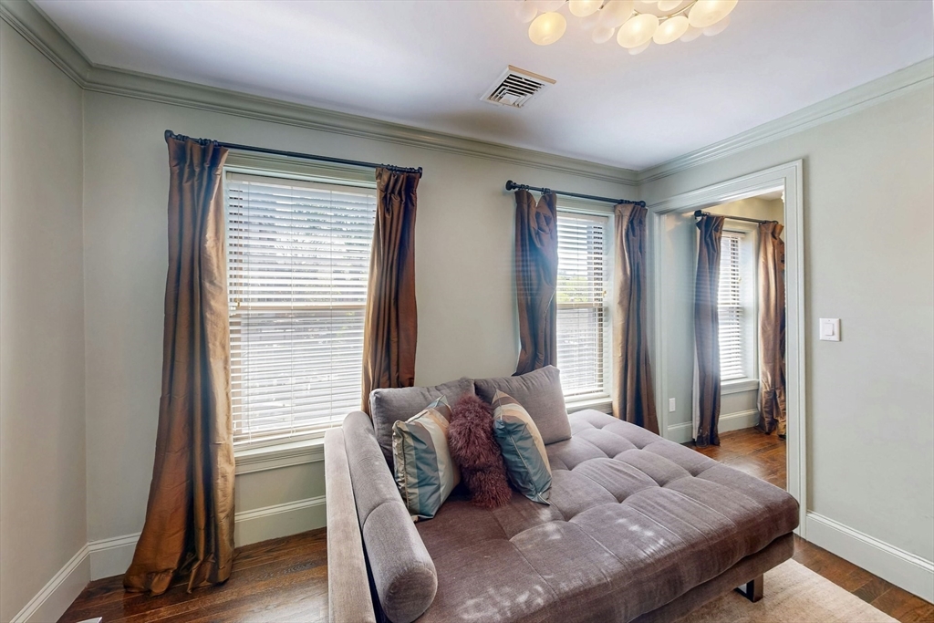 38 Worcester Street, Unit 3 Boston, MA 02118 - Photo 5 of 24 a bedroom with a bed and windows