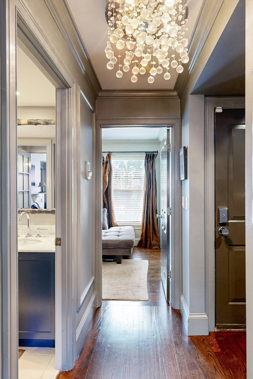 38 Worcester Street, Unit 3 Boston, MA 02118 - Photo 7 of 24 a view of a hallway with a livingroom and furniture