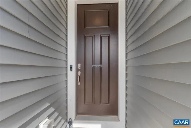 a view of kitchen and wooden floor