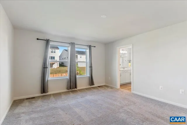 a bathroom with a double vanity sink mirror and double