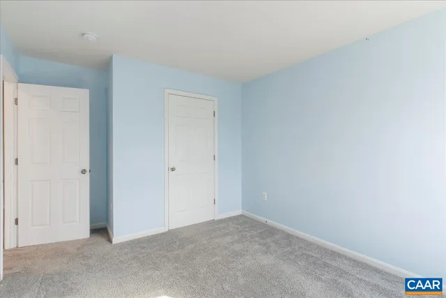 a bathroom with a sink vanity granite and a mirror