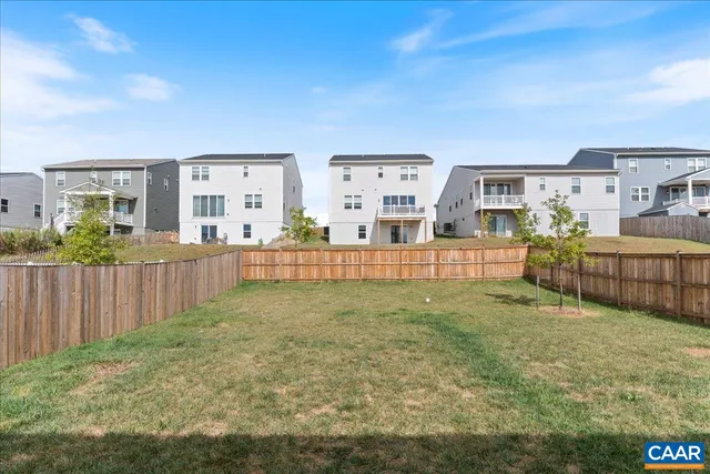 a house view with a backyard space