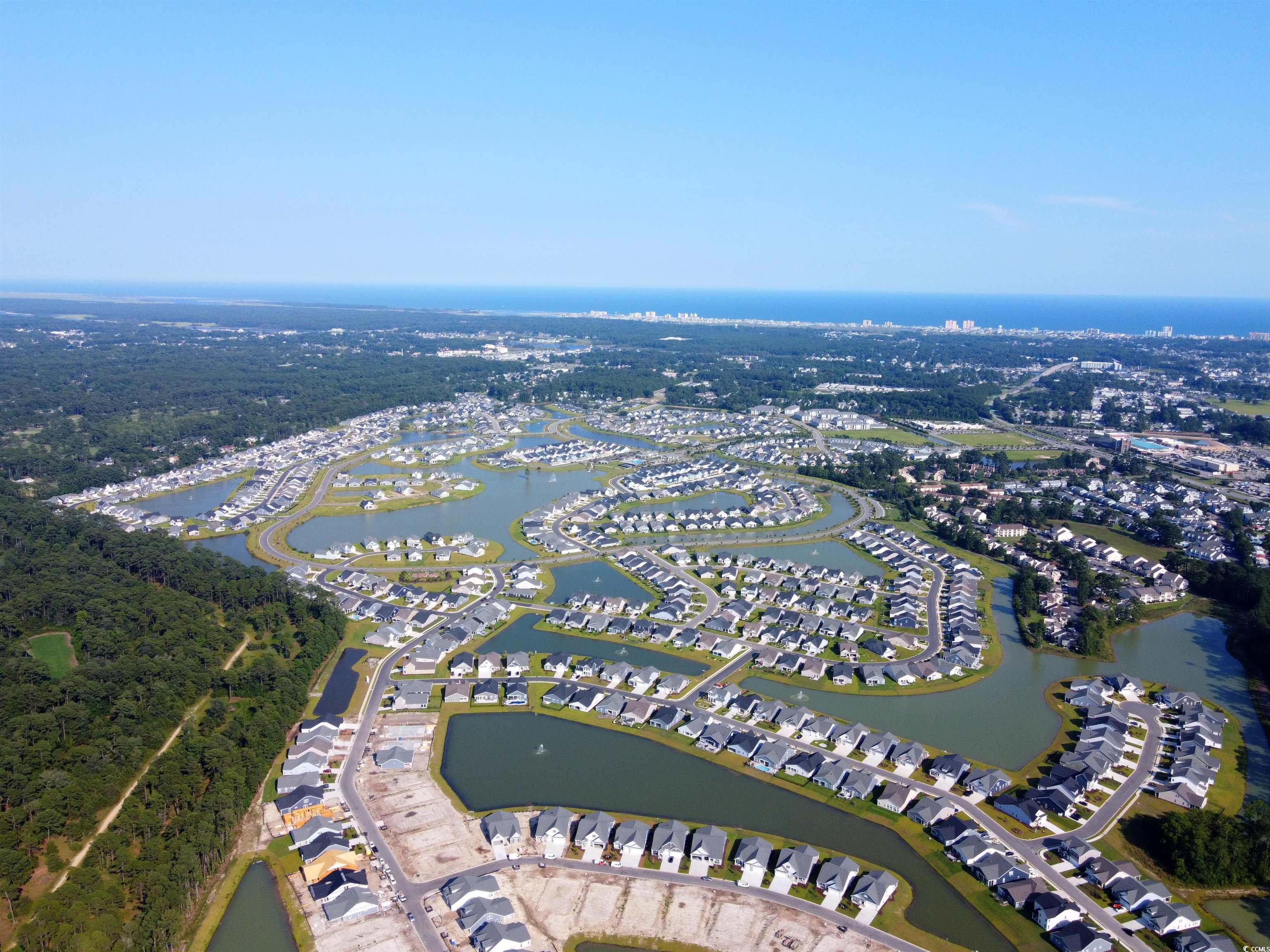 763 St Vincent Loop Little River, SC 29566 - Photo 6 of 33 Aerial view of property's location with a nearby body of water