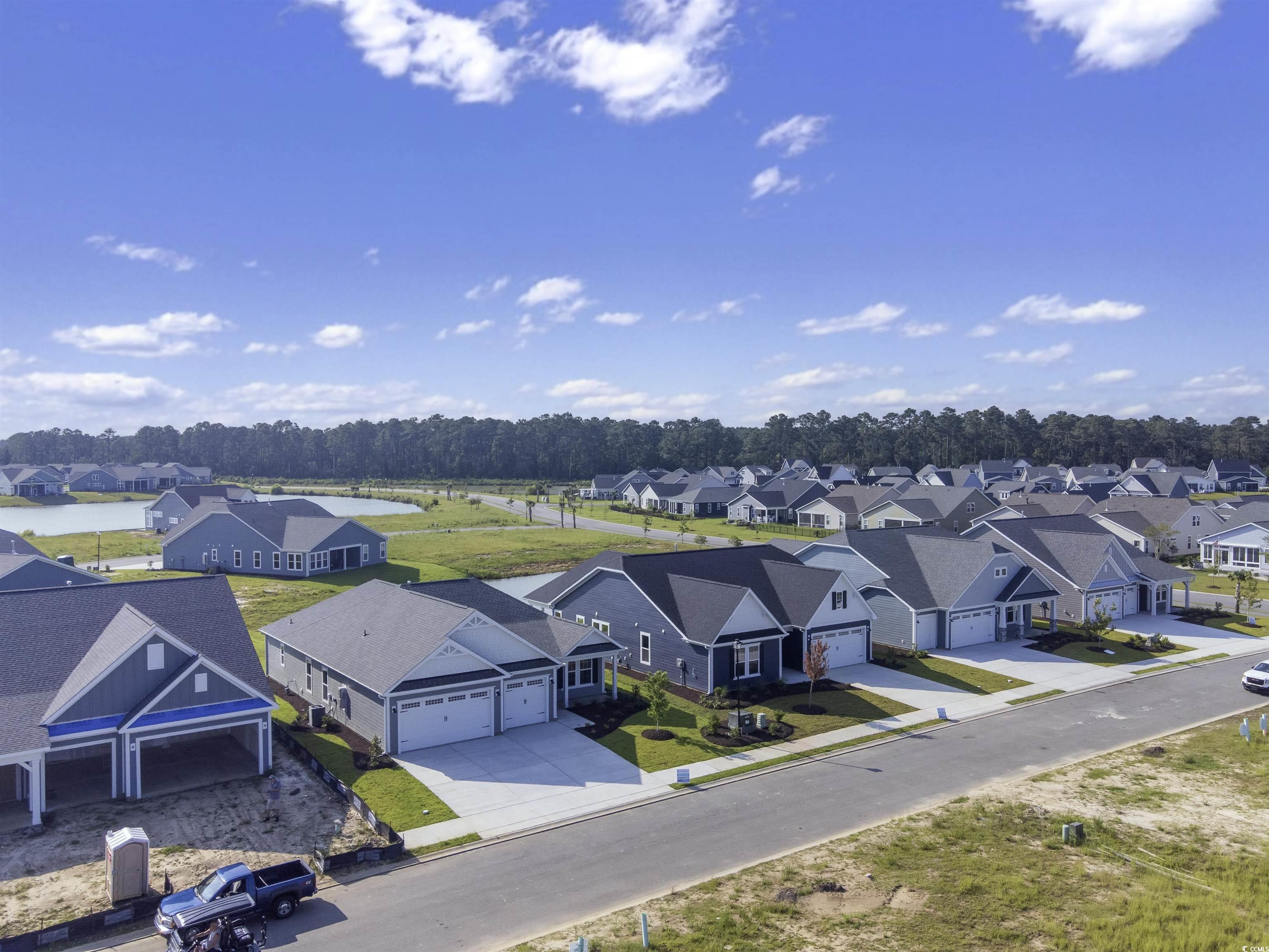 763 St Vincent Loop Little River, SC 29566 - Photo 7 of 33 Aerial perspective of suburban area