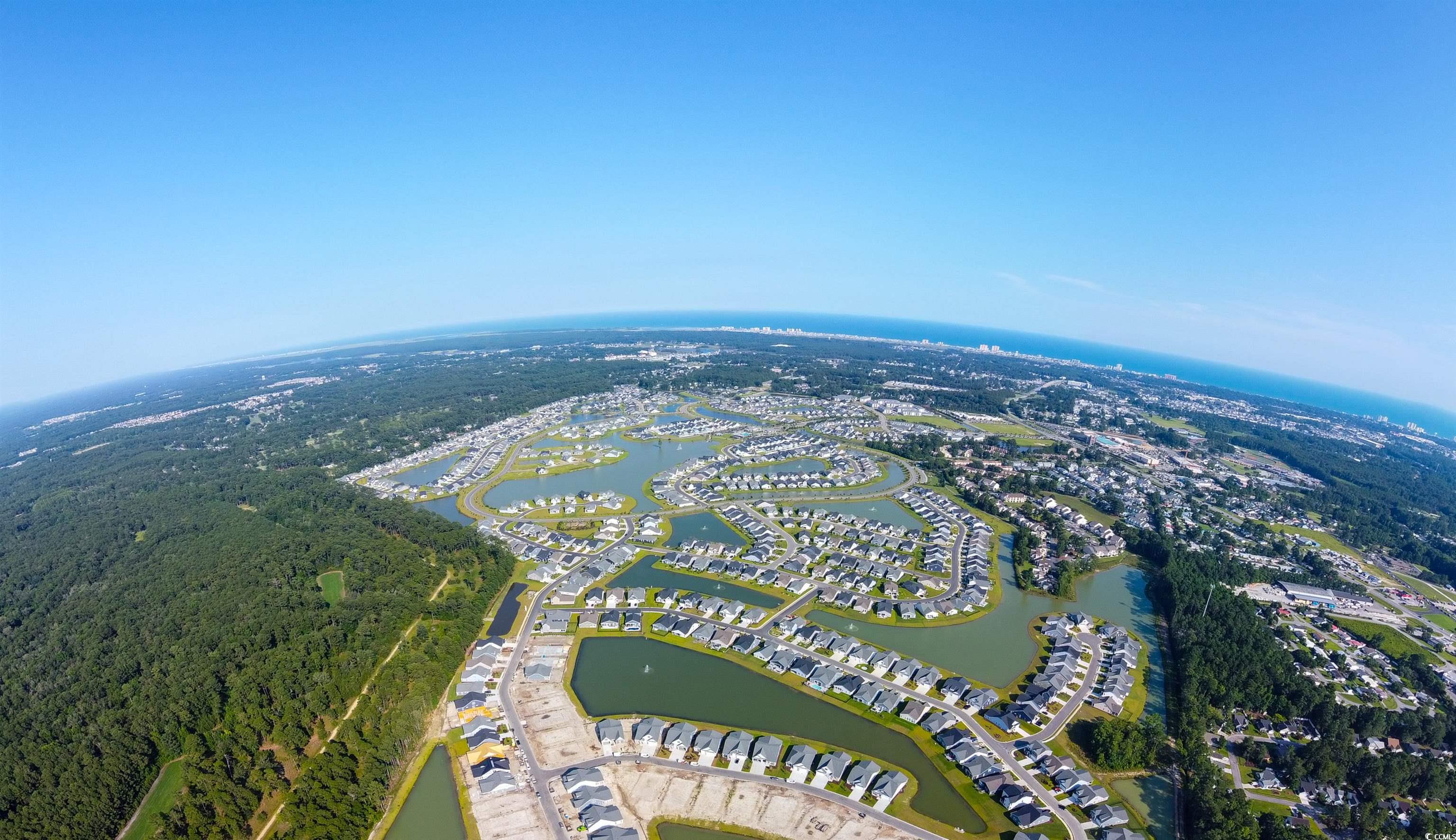 763 St Vincent Loop Little River, SC 29566 - Photo 8 of 33 Aerial overview of property's location with a nearby body of water
