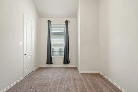 an empty room with closet