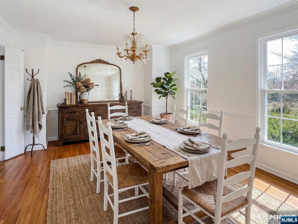 139 Berkeley Circle Bernards, NJ 07920 - Photo 5 of 36 a view of a dining room with furniture window and wooden floor