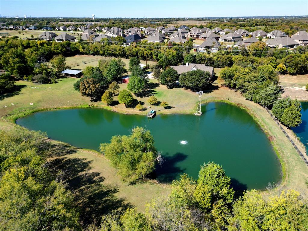 354 Jobson Road Sunnyvale, TX 75182 - Photo 12 of 39 an aerial view of a house with a yard and lake view
