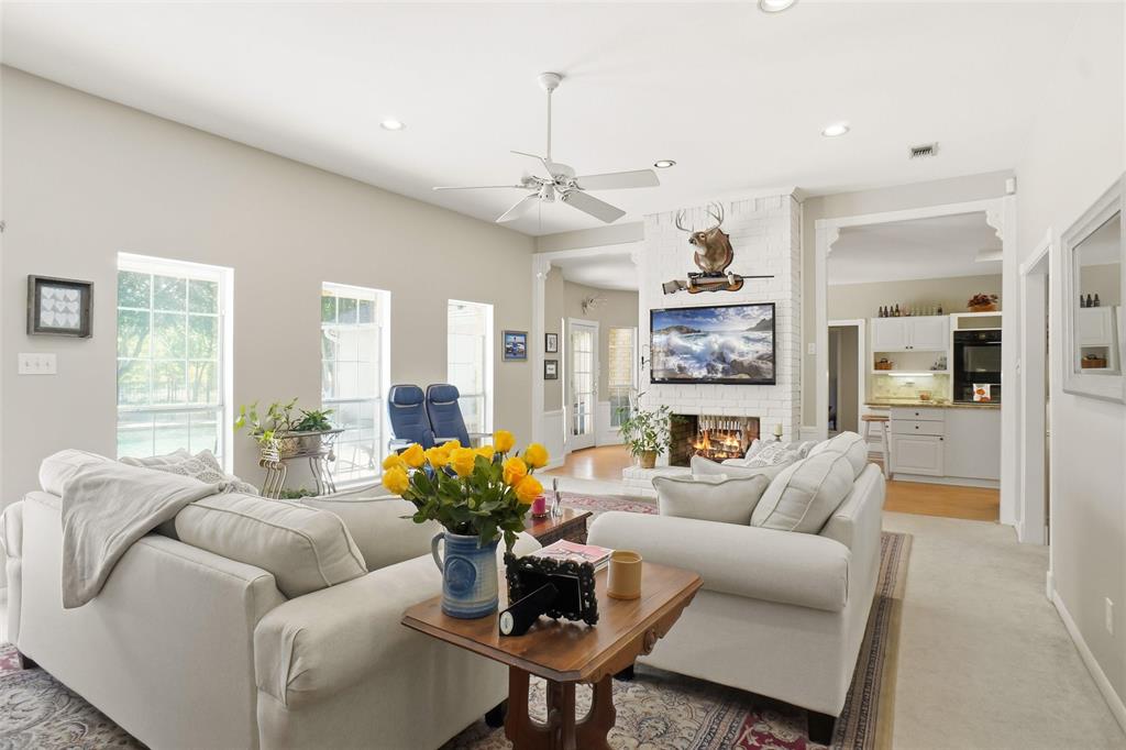 354 Jobson Road Sunnyvale, TX 75182 - Photo 18 of 39 a living room with furniture potted plant and a chandelier