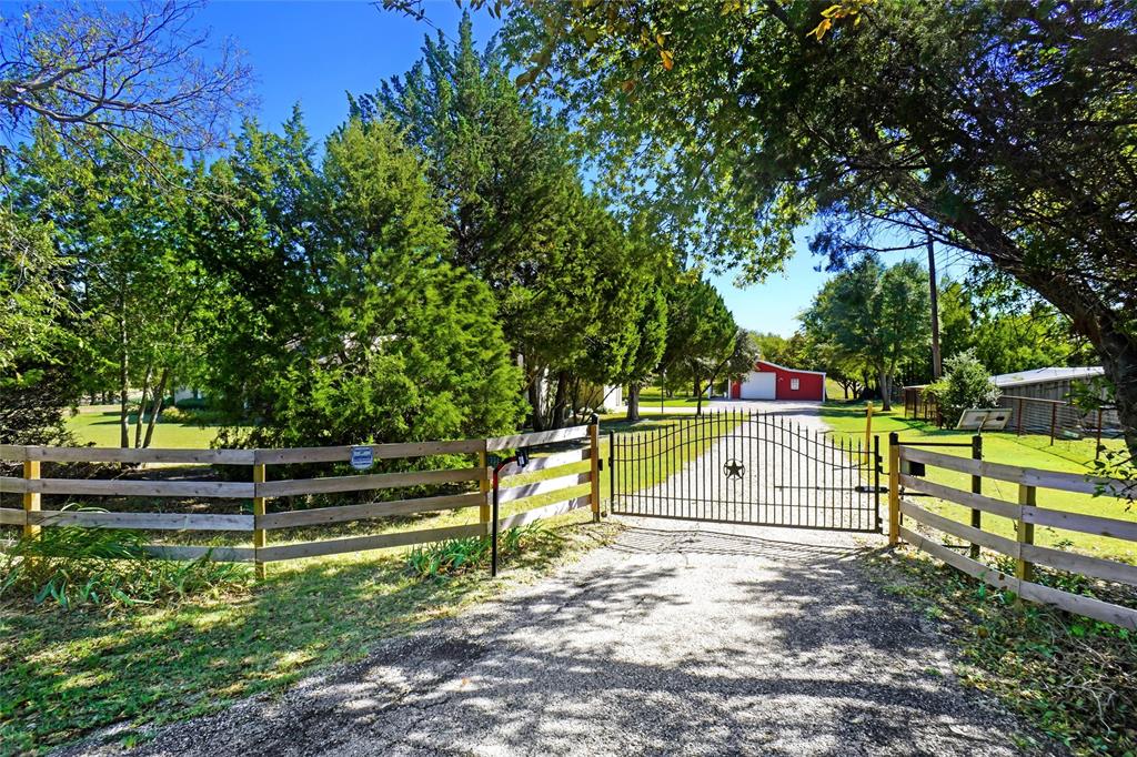 354 Jobson Road Sunnyvale, TX 75182 - Photo 2 of 39 a view of park with a bench