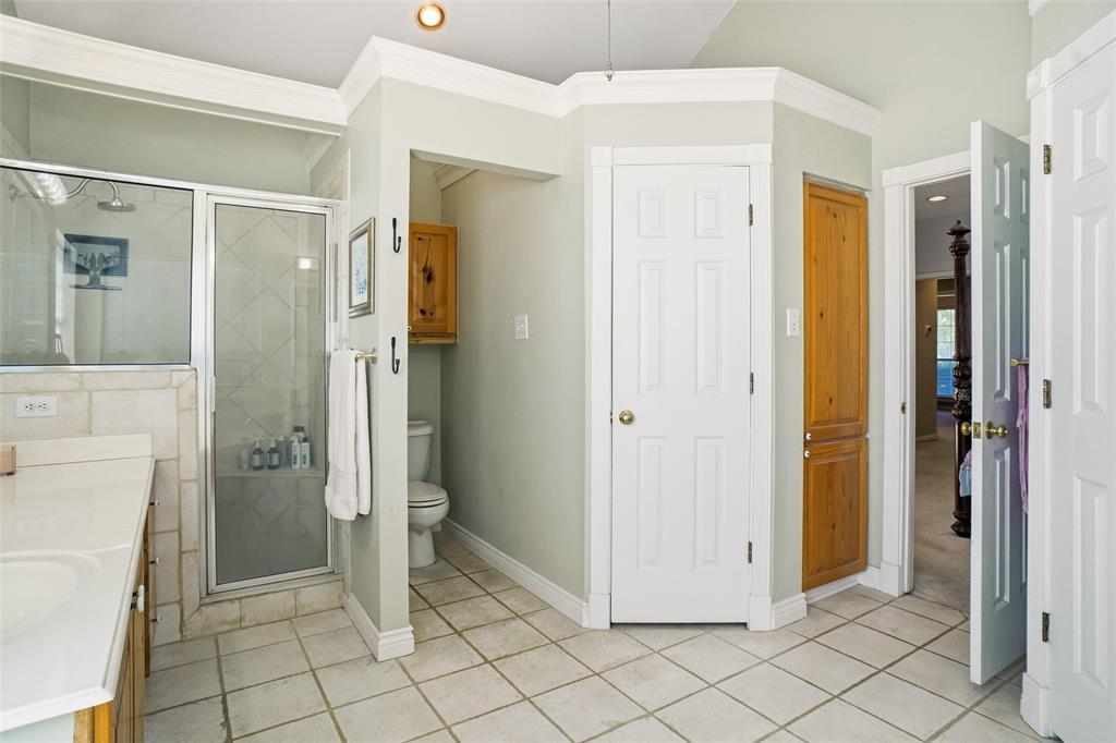 354 Jobson Road Sunnyvale, TX 75182 - Photo 31 of 39 a view of a bathroom with a shower and a sink