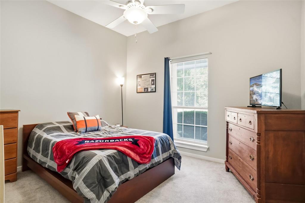 354 Jobson Road Sunnyvale, TX 75182 - Photo 32 of 39 a bedroom with bed and a window