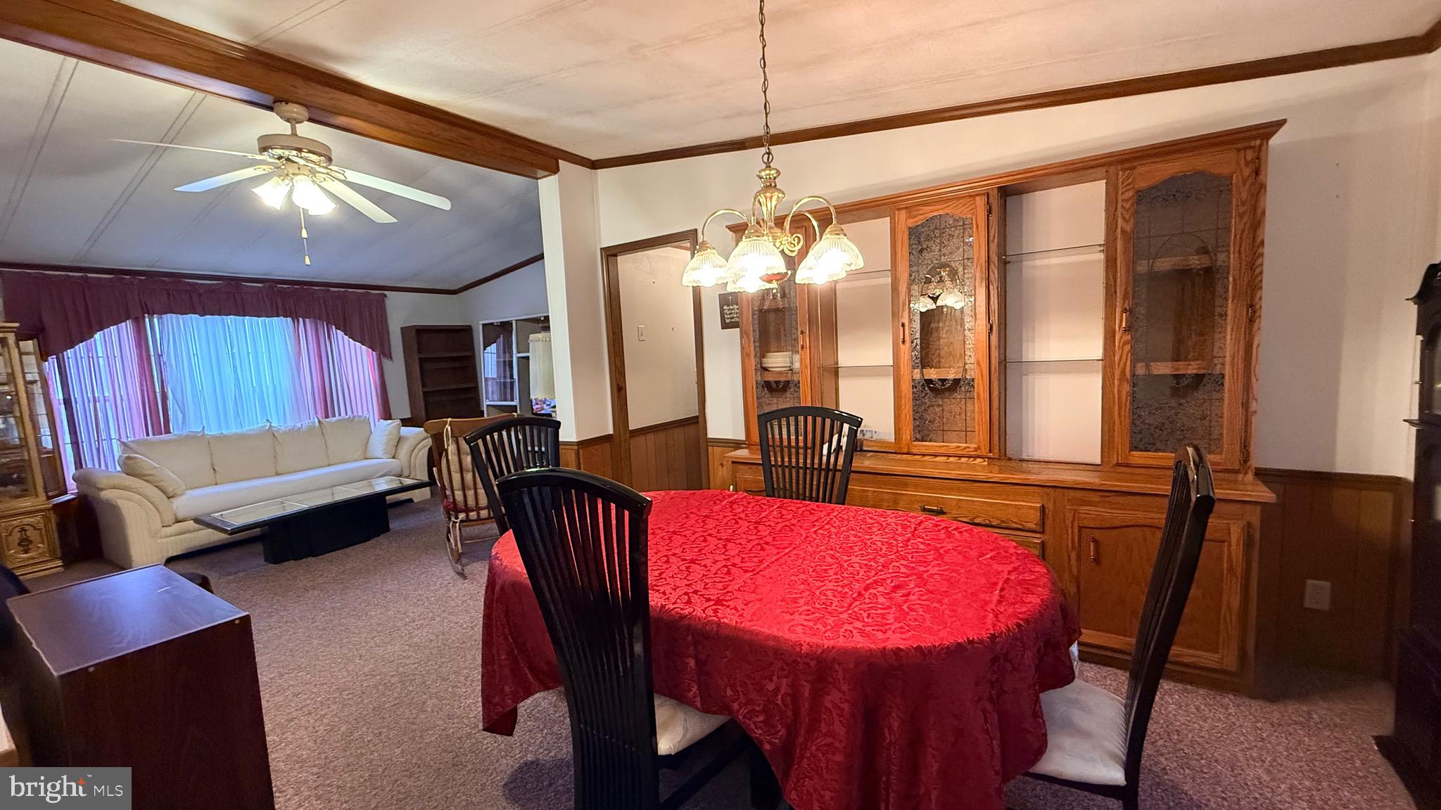 581 Miles Standish Lane Buena, NJ 08310 - Photo 13 of 34 a view of a dining room with furniture and window