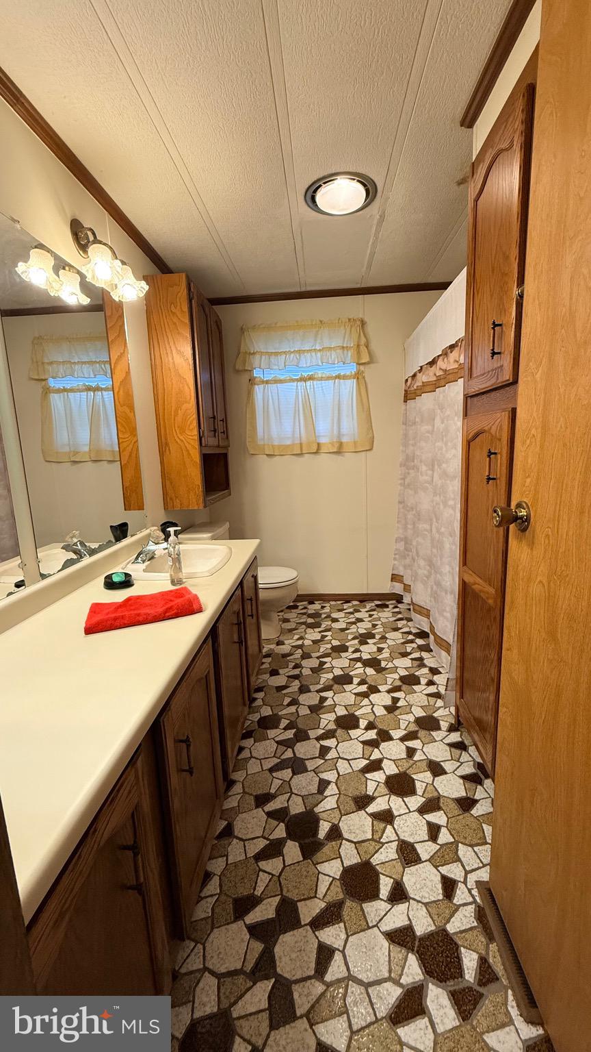 581 Miles Standish Lane Buena, NJ 08310 - Photo 18 of 34 a room with storage and utility