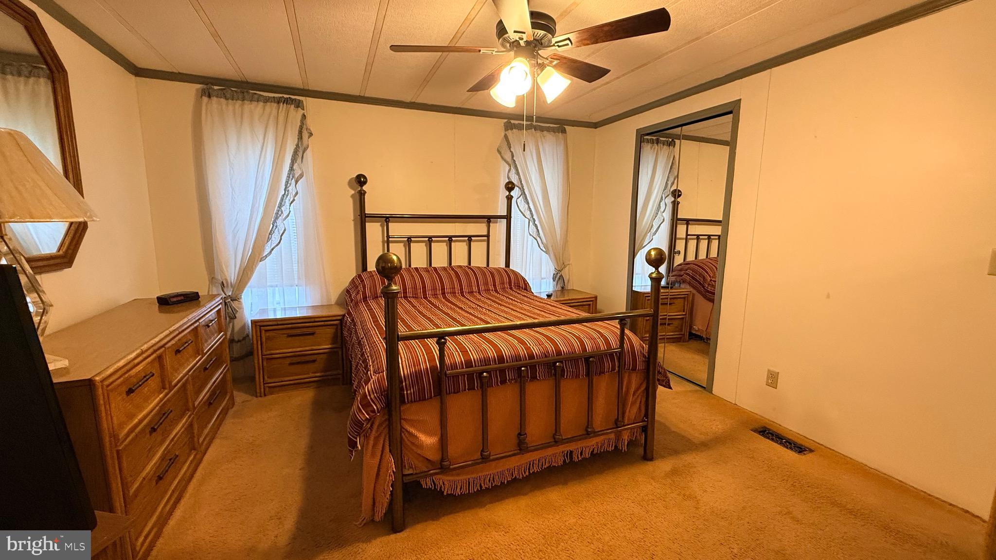 581 Miles Standish Lane Buena, NJ 08310 - Photo 8 of 34 a bedroom with furniture and a window